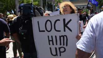 A protestor outside President Donald Trump's arraignment |  Michele Eve Sandberg/Sipa USA/Newscom